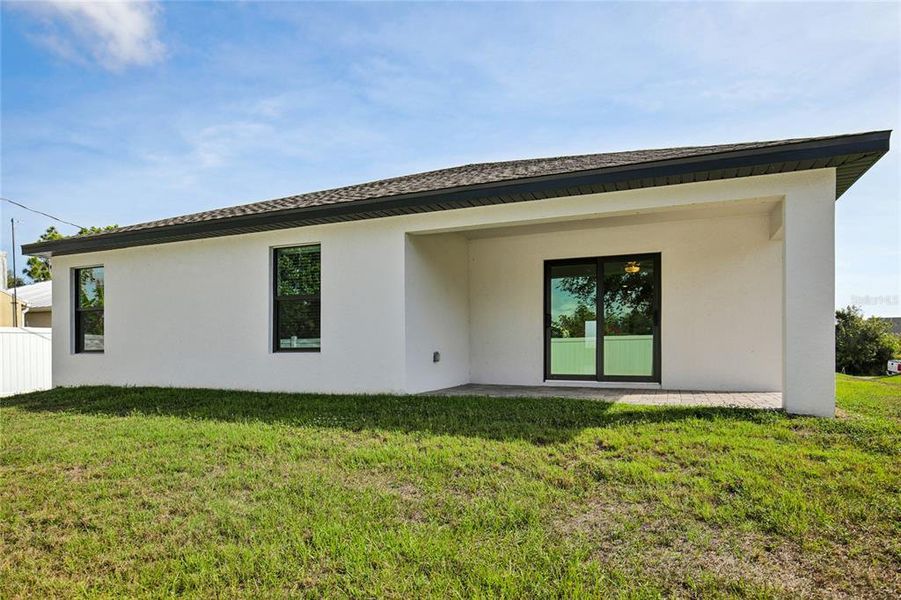Exterior details and patio area of a home in , Port Charlotte (Image 4).