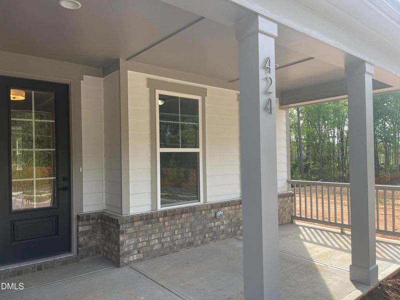 Exterior details and patio area of a home in Sage on North Main, Wake Forest (Image 3).