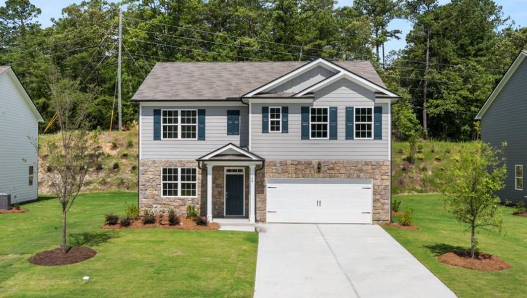 Front exterior of a new home in Northwoods at Mirror Lake, Villa Rica, GA, highlighting curb appeal (Image 22).