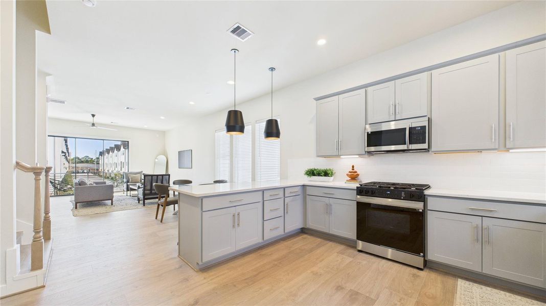 And loads of storage. Kitchen peninsula as bar seating on the other side. And loads of storage. Kitchen peninsula as bar seating on the other side.