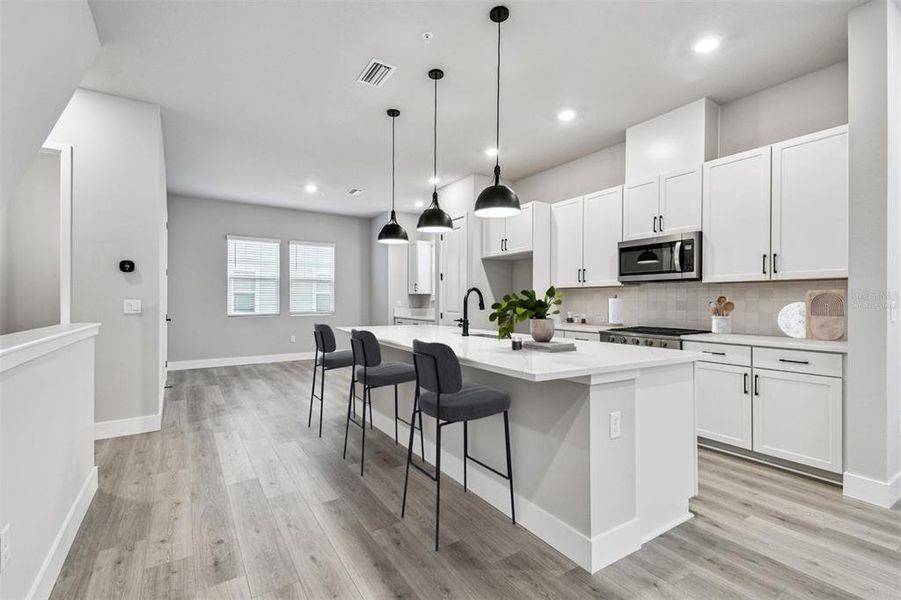 Furnished interior view inside a new home in Towns at Union, St. Petersburg (Image 4).