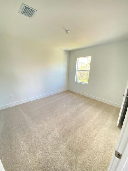 Spacious, unfurnished interior of a new home in Preserves at Park Trace, Stuart (Image 13).