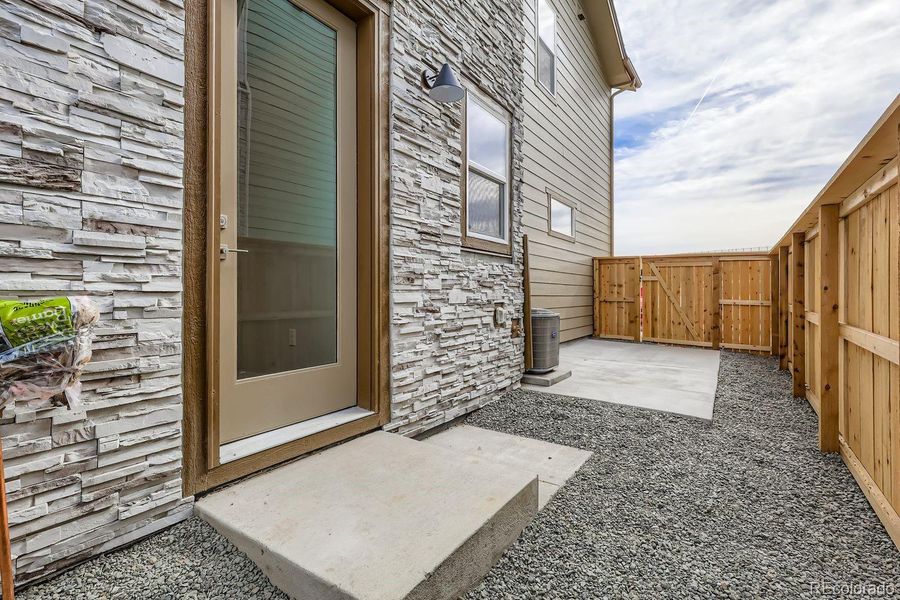 Exterior details and patio area of a home in Uplands, Westminster (Image 23).