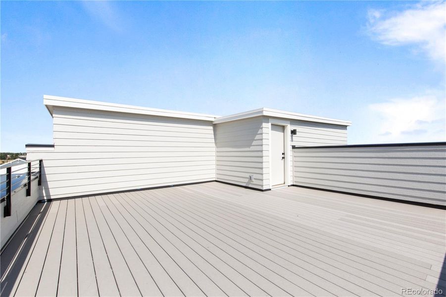 Front exterior of a new home in Dillon Pointe - Skyview, Broomfield, CO, highlighting curb appeal (Image 17).