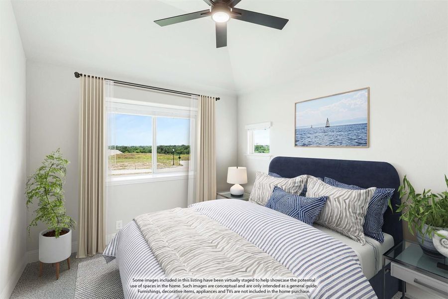 Bedroom with vaulted ceiling, ceiling fan, navy upholstered headboard, and large window with outdoor view