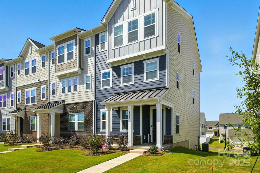 Front exterior of a new home in , Fort Mill, SC, highlighting curb appeal (Image 20).