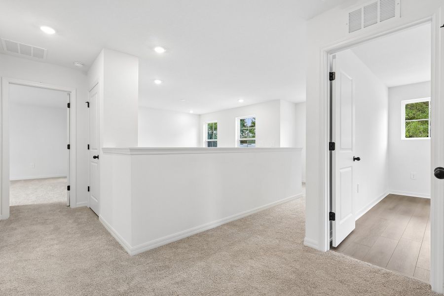 Representative unfurnished interior of a home built from the Florence by Hartizen Homes in Estes Reserve, Eustis (Image 101). Representative unfurnished interior of a home built from the Florence by Hartizen Homes in Estes Reserve, Eustis (Image 101).