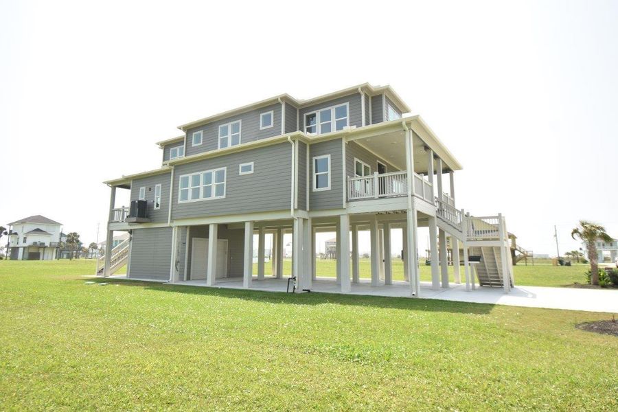 Front exterior of a new home in , Galveston, TX, highlighting curb appeal (Image 23). Front exterior of a new home in , Galveston, TX, highlighting curb appeal (Image 23).