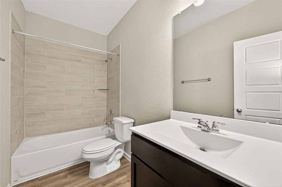 Furnished interior view inside a new home in Mill Creek Trails, Magnolia (Image 8). Furnished interior view inside a new home in Mill Creek Trails, Magnolia (Image 8).