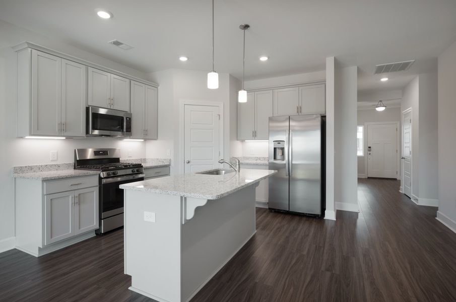 Representative furnished interior of a home built from the The Harper by Cothran Homes in Holly Ridge, Greenville (Image 5).