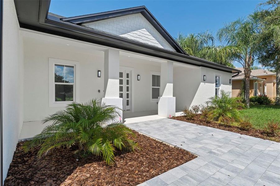 Front exterior of a new home in , Winter Haven, FL, highlighting curb appeal (Image 31).