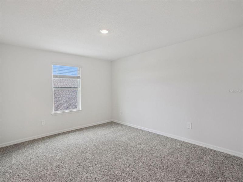 Spacious, unfurnished interior of a new home in Oakfield Trails - Signature Series, Parrish (Image 12).