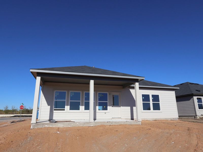 Exterior details and patio area of a home in Carillon, Manor (Image 4).