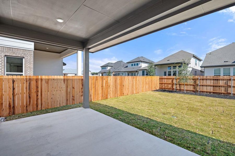 Exterior details and patio area of a home in Arbor Collection at Heritage, Dripping Springs (Image 23). Exterior details and patio area of a home in Arbor Collection at Heritage, Dripping Springs (Image 23).