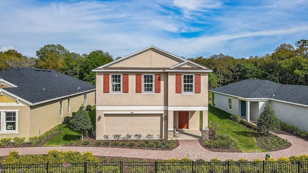 Representative exterior photo of a completed home built from the Elm by Taylor Morrison in Cove at Coasterra, Palmetto, FL (Image 16).