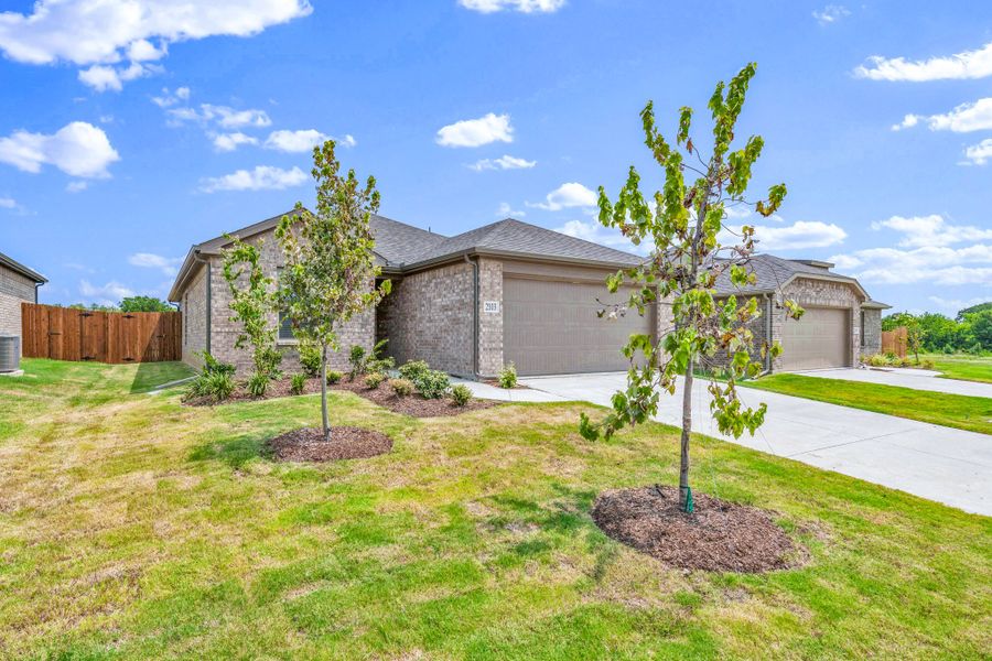 Front exterior of a new home in Stonecreek, Sulphur Springs, TX, highlighting curb appeal (Image 22).