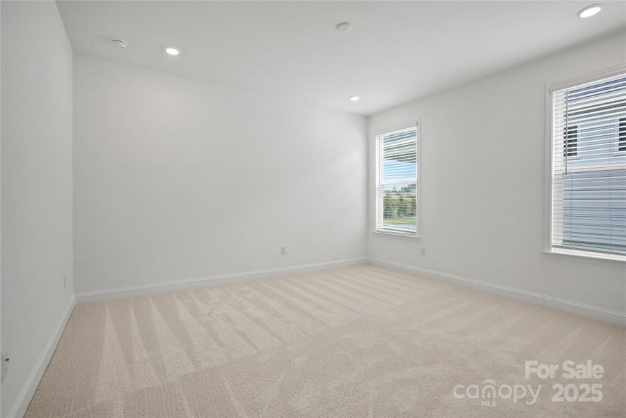 Spacious and bright primary bedroom