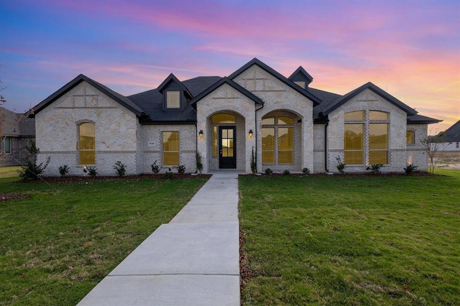 Front exterior of a new home in Ten Mile Creek Estates, DeSoto, TX, highlighting curb appeal (Image 20).