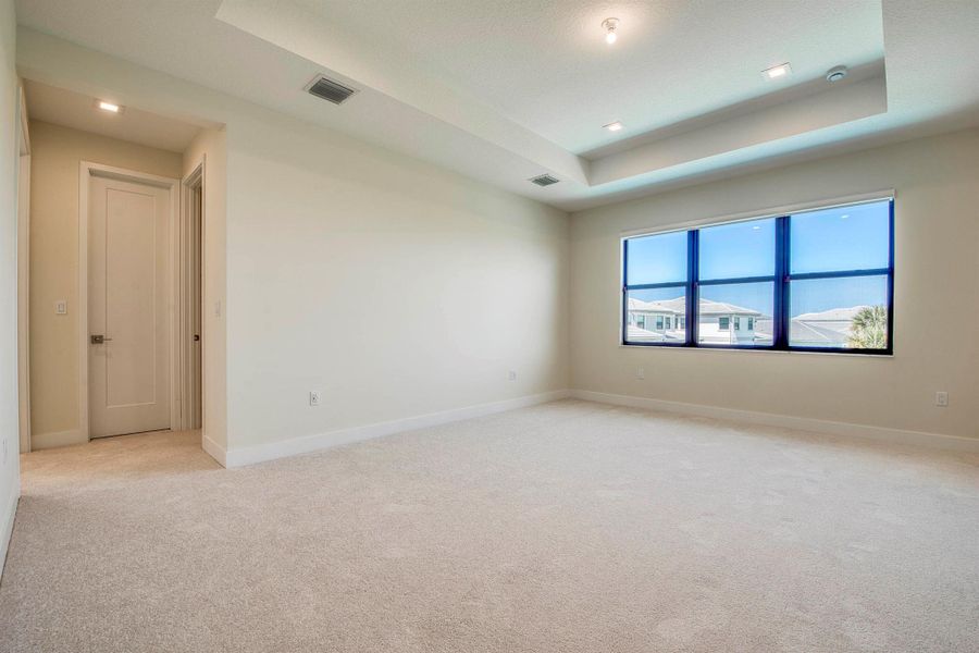 Furnished interior view inside a new home in Apex at Avenir, Palm Beach Gardens (Image 15).