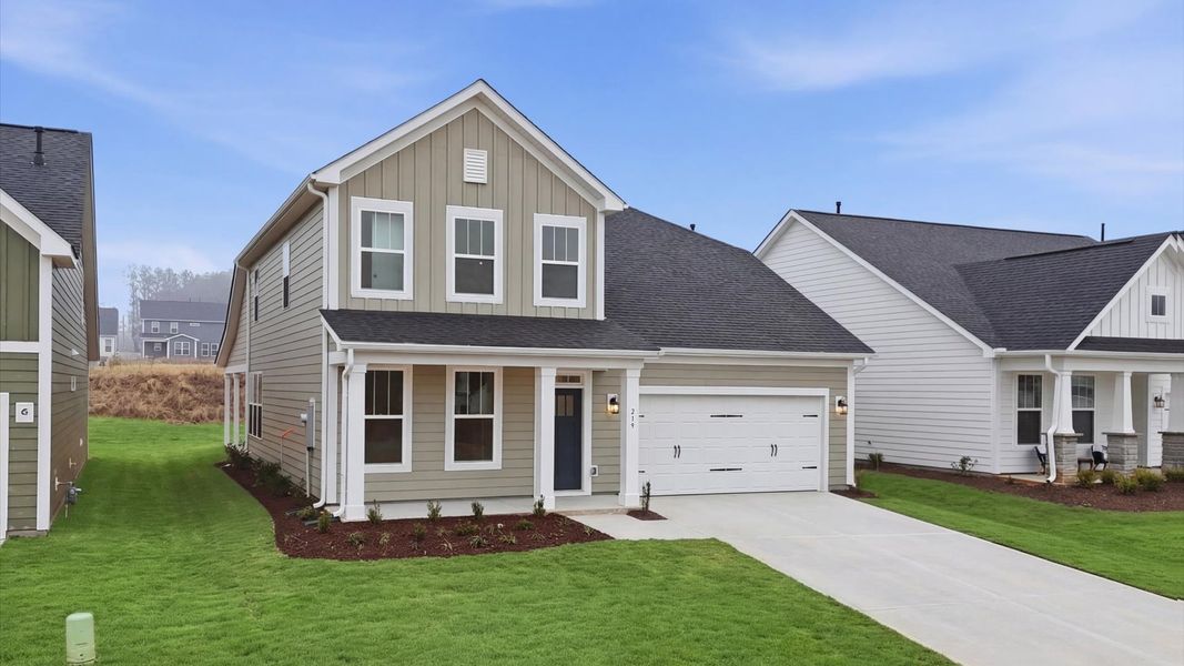 Front exterior of a new home in Mulberry Estates, Simpsonville, SC, highlighting curb appeal (Image 1). Front exterior of a new home in Mulberry Estates, Simpsonville, SC, highlighting curb appeal (Image 1).
