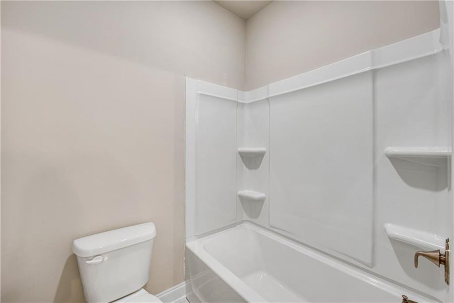 Furnished interior view inside a new home in Hidden Fields, Hoschton (Image 15).