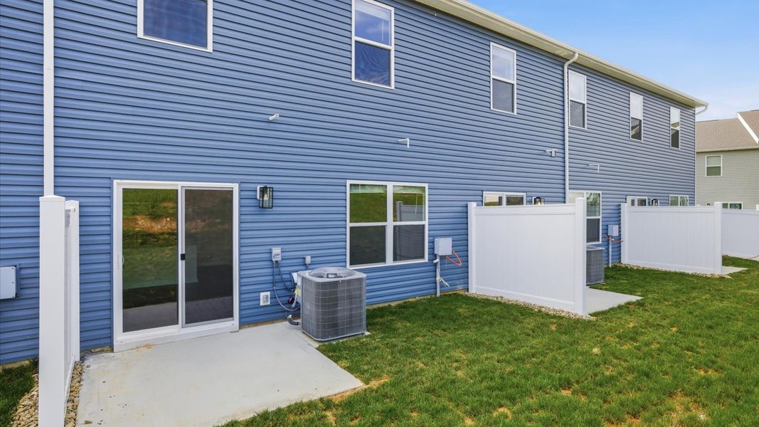 Exterior details and patio area of a home in Cherokee Crossing, Kodak (Image 2).