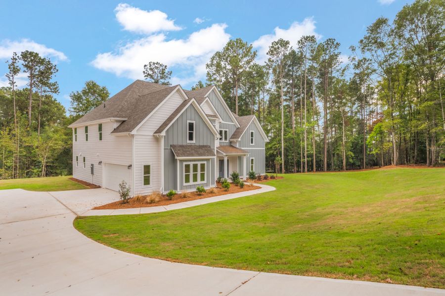 Front exterior of a new home in Mill Race Road, Thomaston, GA, highlighting curb appeal (Image 2). Front exterior of a new home in Mill Race Road, Thomaston, GA, highlighting curb appeal (Image 2).
