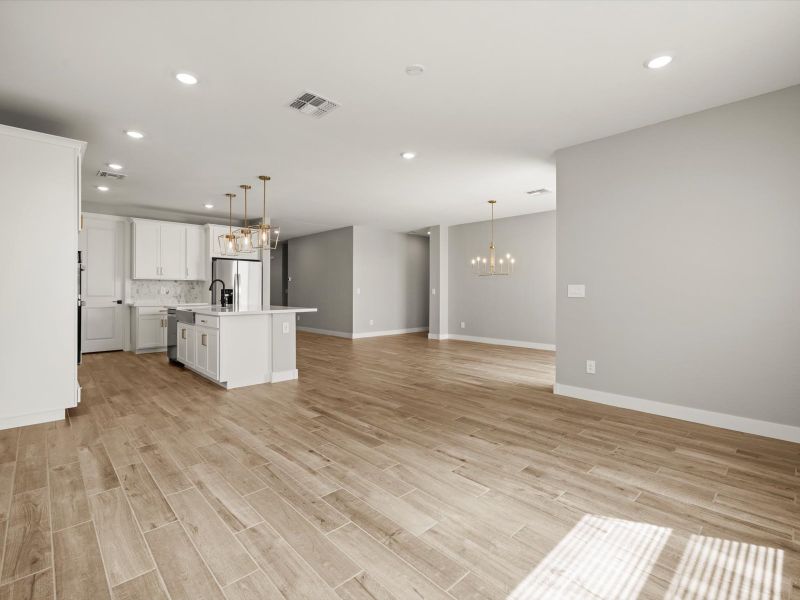 Spacious, unfurnished interior of a new home in White Tank Foothills Reserve Series, Waddell (Image 7).