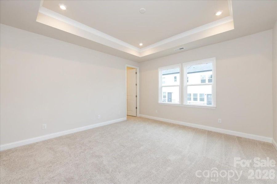 Primary Bedroom with Tray Ceiling