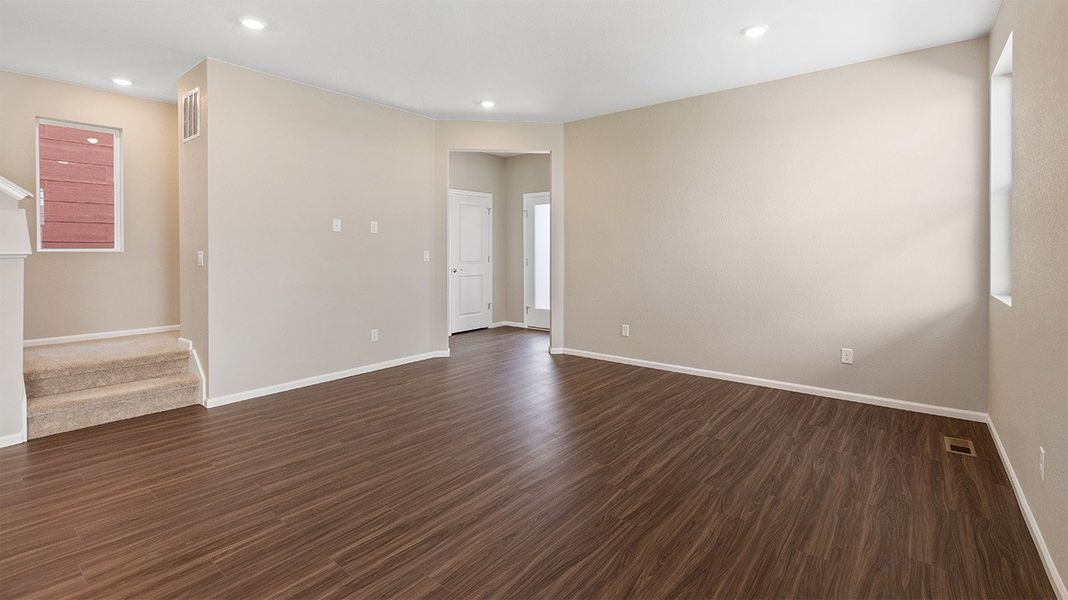 Spacious, unfurnished interior of a new home in Woodrose at Painted Prairie, Aurora (Image 8).