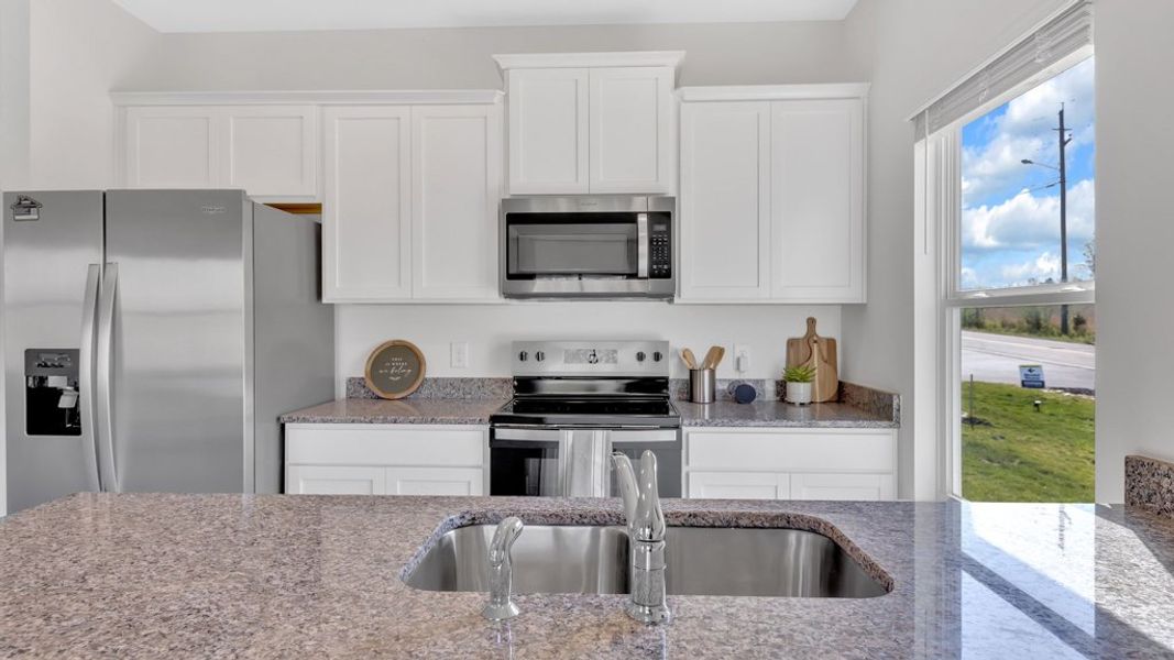 Representative furnished interior of a home built from the Altamont Townhome by D.R. Horton in Macon Townhomes, Seymour (Image 30).