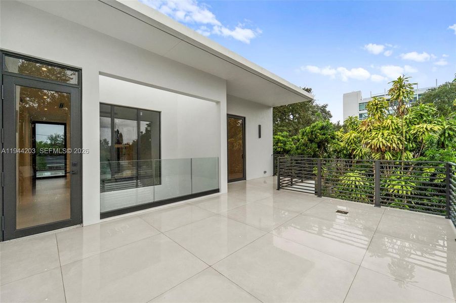 Exterior details and patio area of a home in , Miami (Image 2). Exterior details and patio area of a home in , Miami (Image 2).