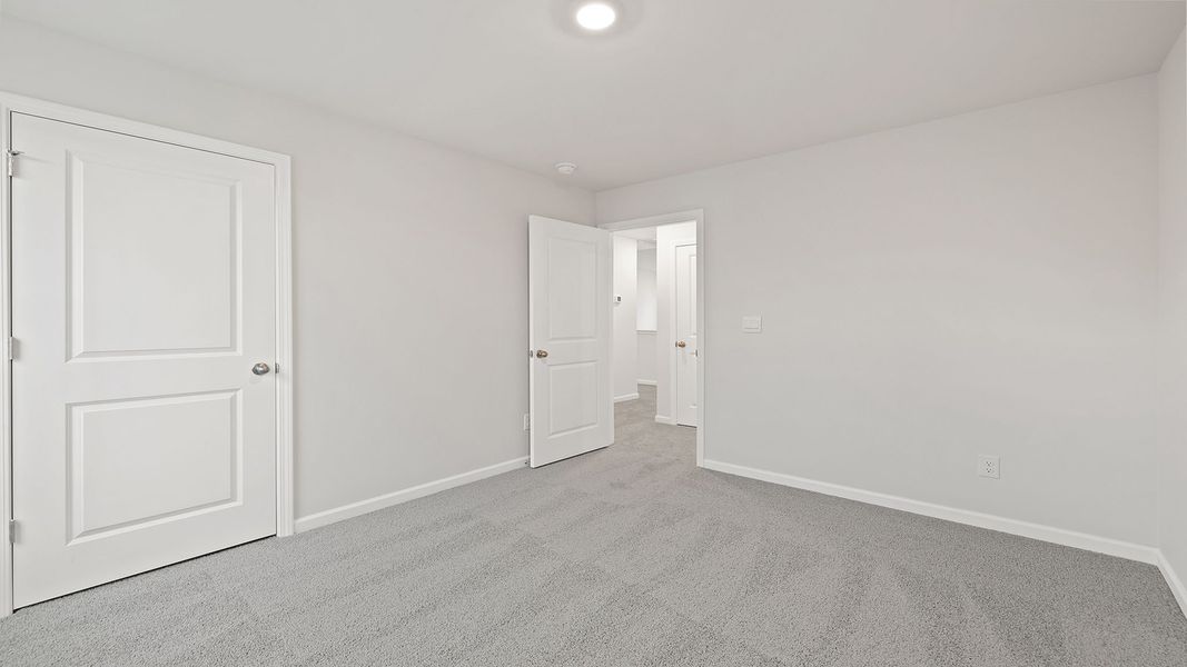 Spacious, unfurnished interior of a new home in Bentley Park, Greenwood (Image 25). Spacious, unfurnished interior of a new home in Bentley Park, Greenwood (Image 25).