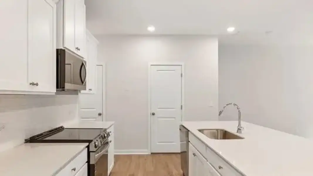 Furnished interior view inside a new home in Sherwood Square, Flowery Branch (Image 10).