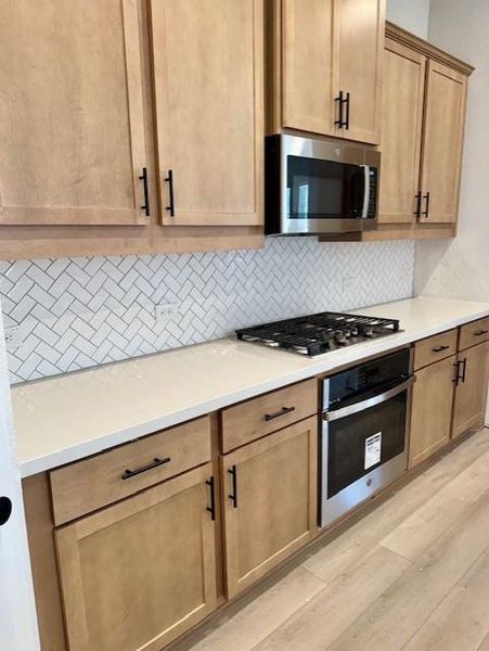 Furnished interior view inside a new home in Heritage, Dripping Springs (Image 10).