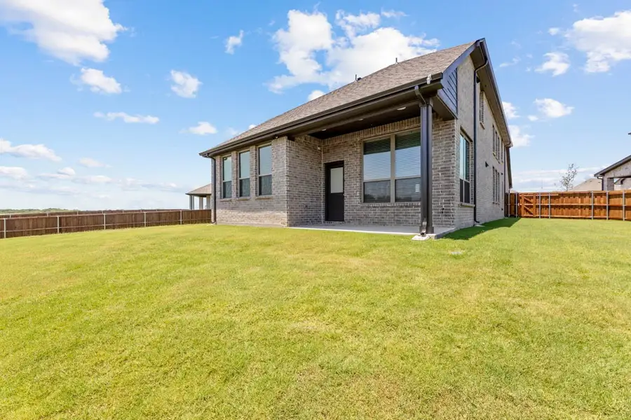 Exterior details and patio area of a home in Heartland, Heartland (Image 3). Exterior details and patio area of a home in Heartland, Heartland (Image 3).