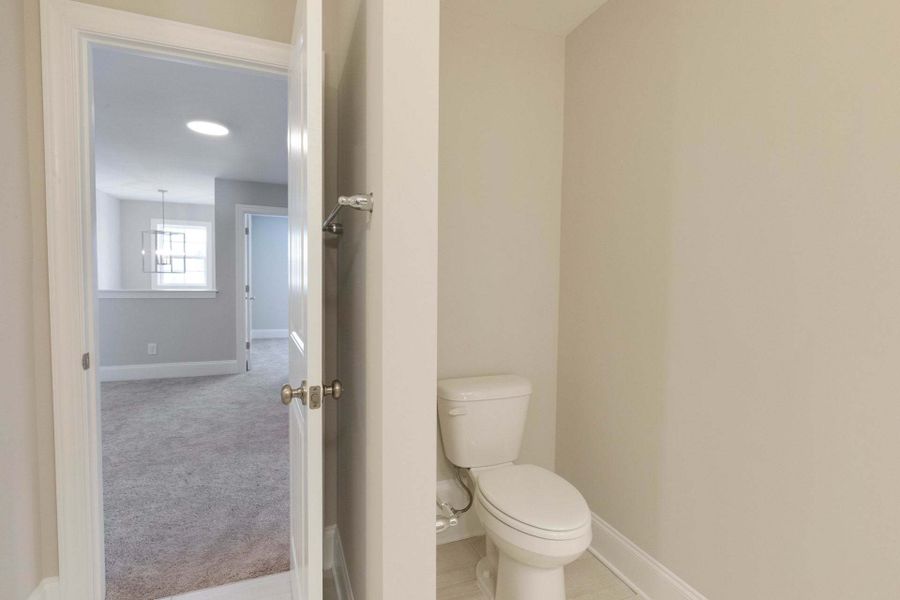 Representative furnished interior of a home built from the Austin by Caviness & Cates Communities in Bartlett Manor, Youngsville (Image 147).