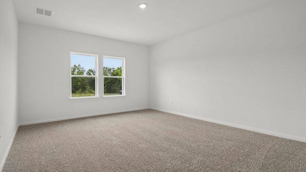 Spacious, unfurnished interior of a new home in Prairie Lakes, Buda (Image 24).