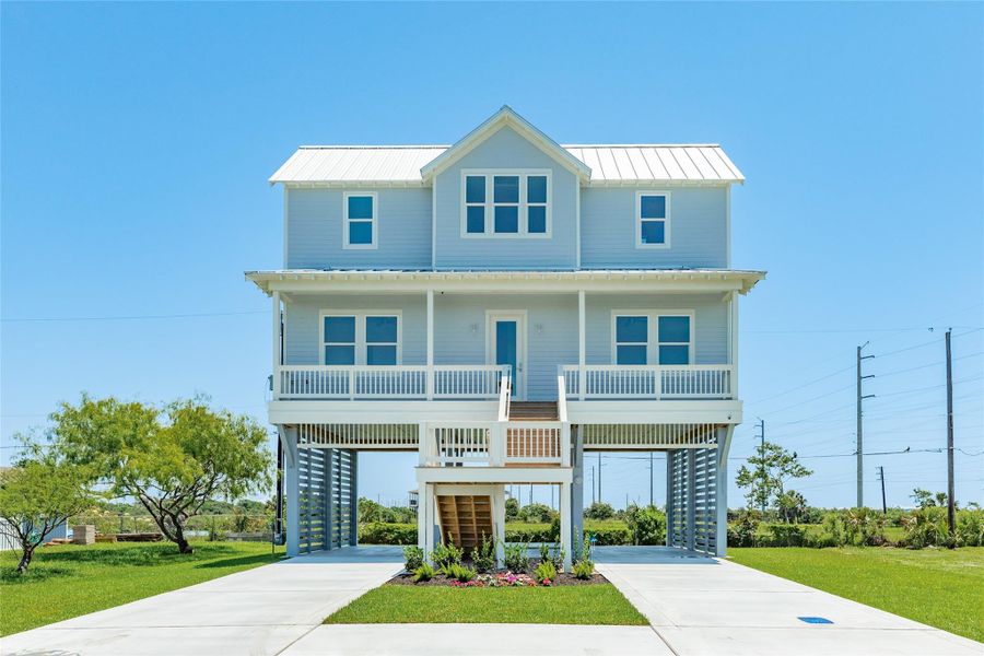 Front exterior of a new home in , Galveston, TX, highlighting curb appeal (Image 20).