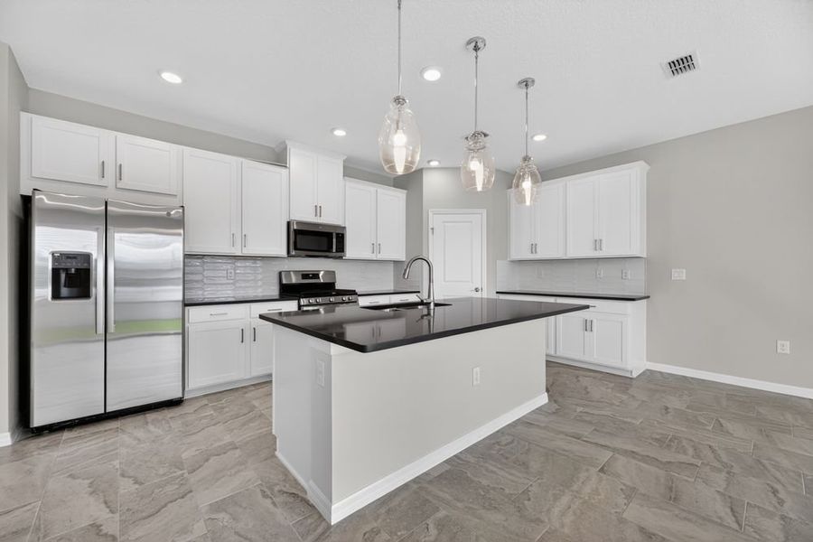 Representative furnished interior of a home built from the Bellflower by Taylor Morrison in Cherry Elm at SilverLeaf, St. Augustine (Image 10).