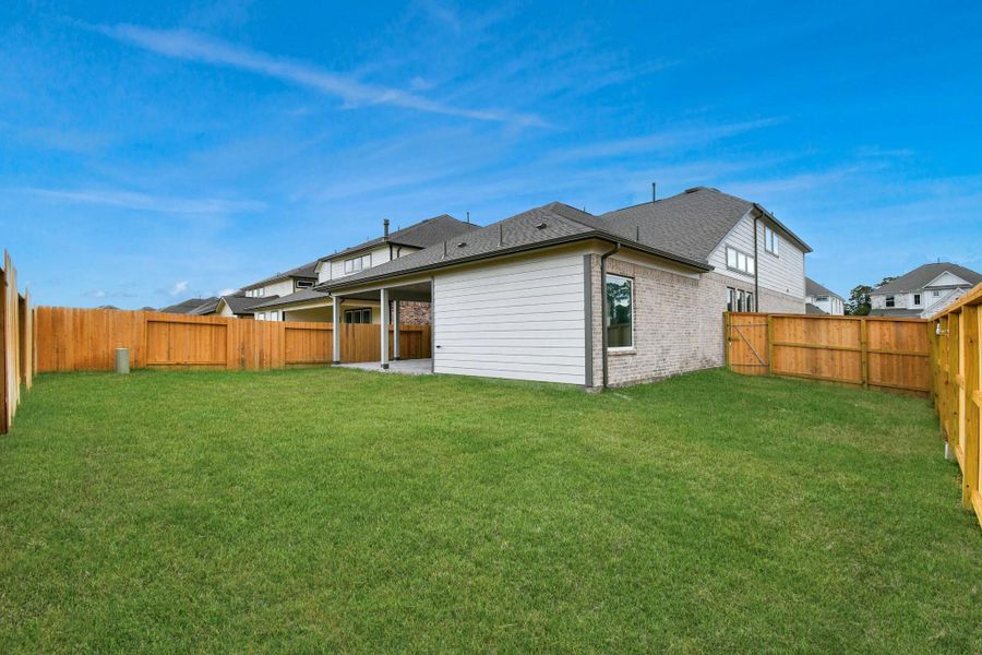 Come and see this spacious backyard with its beautiful covered patio. There is plenty of room for the kids to play and adults to relax. Perfect for your outdoor living space, patio furniture, bbq pit, and so much more. The possibilities are endless! Come and see this spacious backyard with its beautiful covered patio. There is plenty of room for the kids to play and adults to relax. Perfect for your outdoor living space, patio furniture, bbq pit, and so much more. The possibilities are endless!