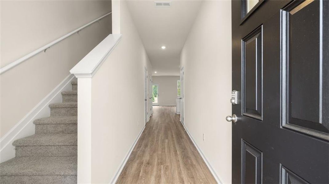 Spacious, unfurnished interior of a new home in Young's Crossing, Stone Mountain (Image 22).