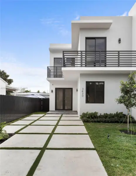 Front exterior of a new home in , Miami, FL, highlighting curb appeal (Image 2). Front exterior of a new home in , Miami, FL, highlighting curb appeal (Image 2).