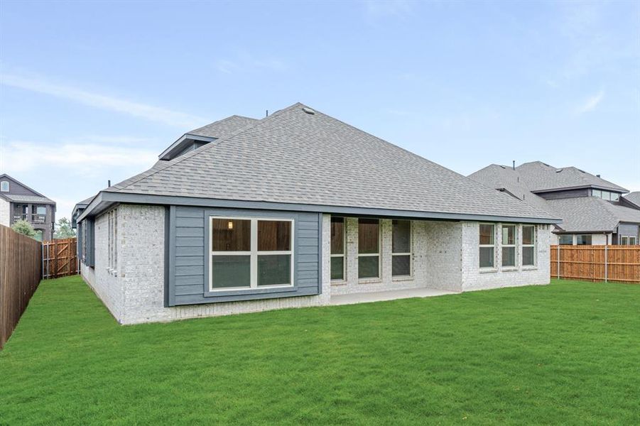 Front exterior of a new home in Hampton Park, Glenn Heights, TX, highlighting curb appeal (Image 24). Front exterior of a new home in Hampton Park, Glenn Heights, TX, highlighting curb appeal (Image 24).