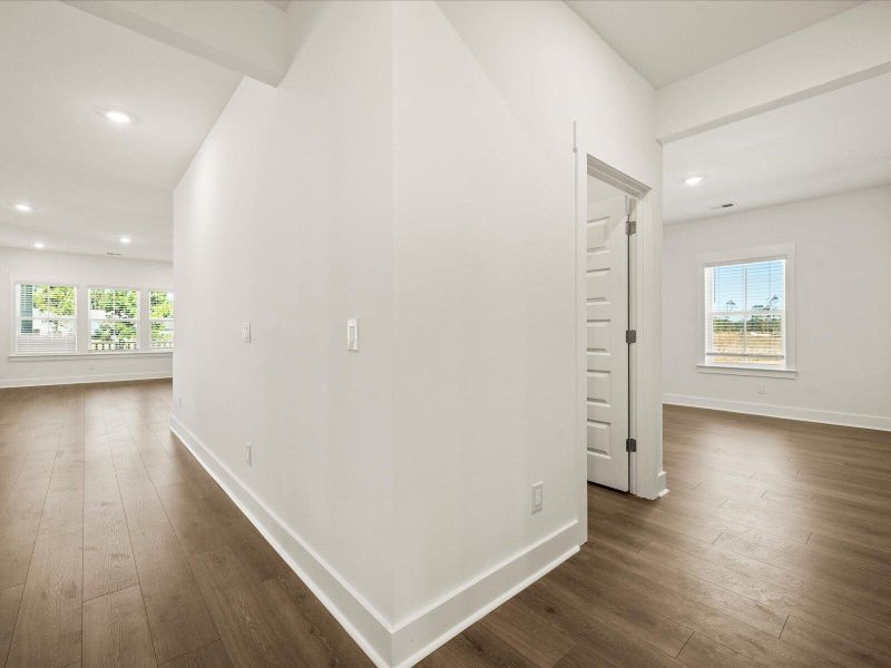 Spacious, unfurnished interior of a new home in The Coves at Lakes of Cane Bay, Summerville (Image 26).