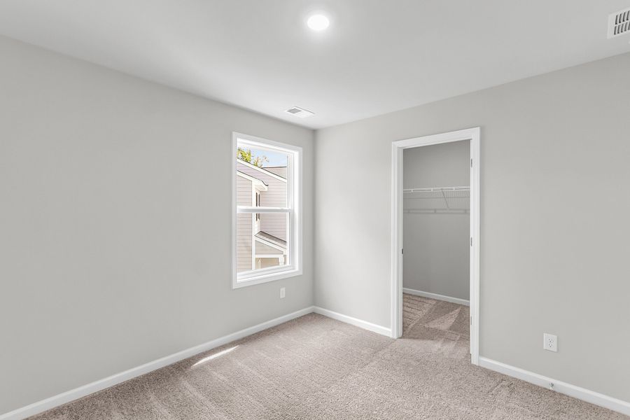 Spacious, unfurnished interior of a new home in Central Creek, Goose Creek (Image 36).