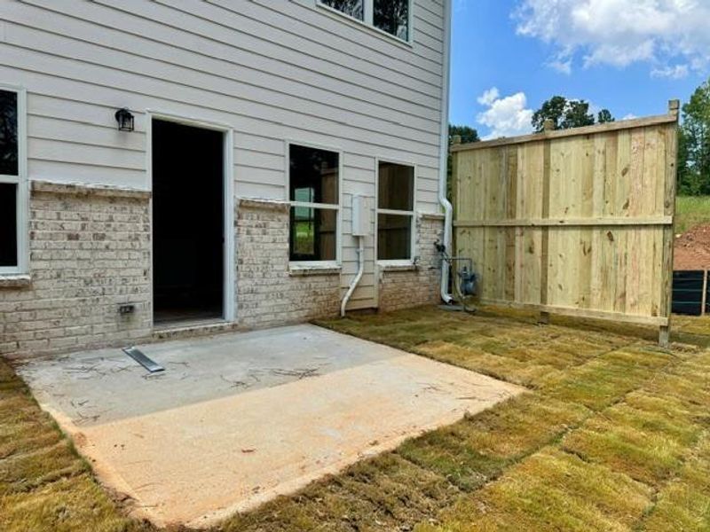 Exterior details and patio area of a home in Park Center Pointe, Mableton (Image 3).