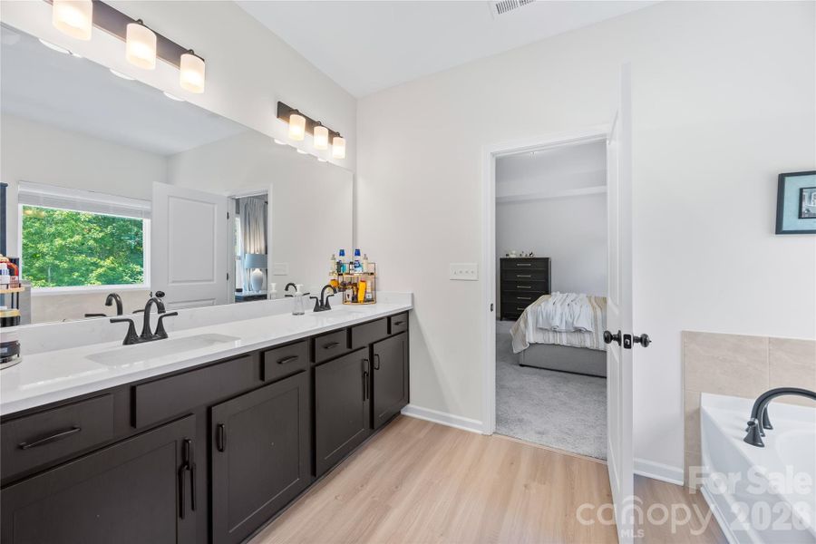 Furnished interior view inside a new home in Orchard Creek, Charlotte (Image 6).