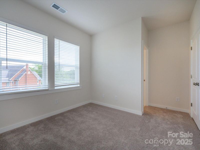 Spacious, unfurnished interior of a new home in Central Living at Craig, Charlotte (Image 16).