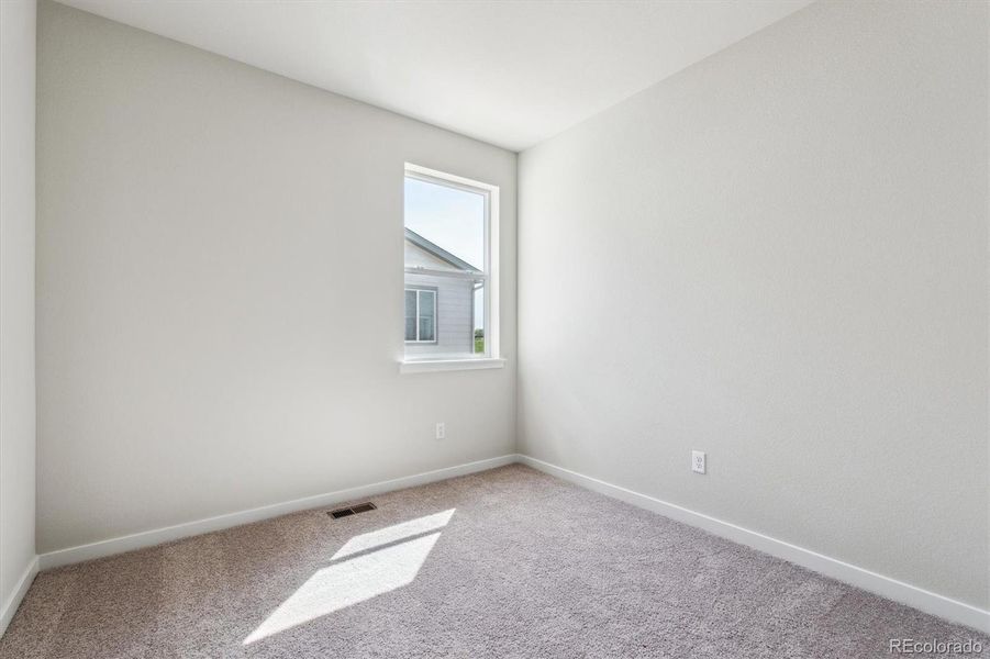 Spacious, unfurnished interior of a new home in Red Barn Meadows, Mead (Image 19).